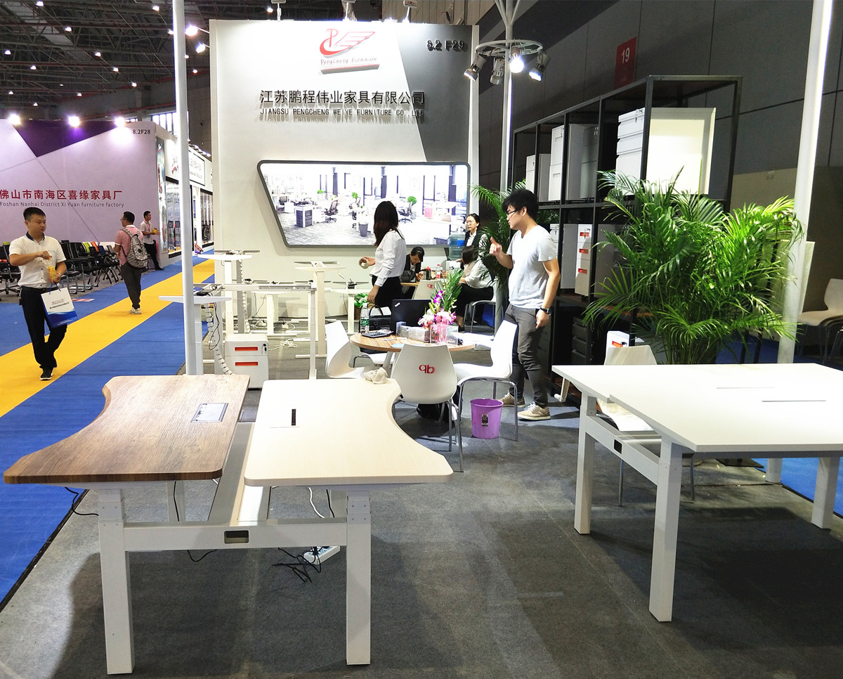 Pengcheng electric height adjustable desk on CIFF Shanghai